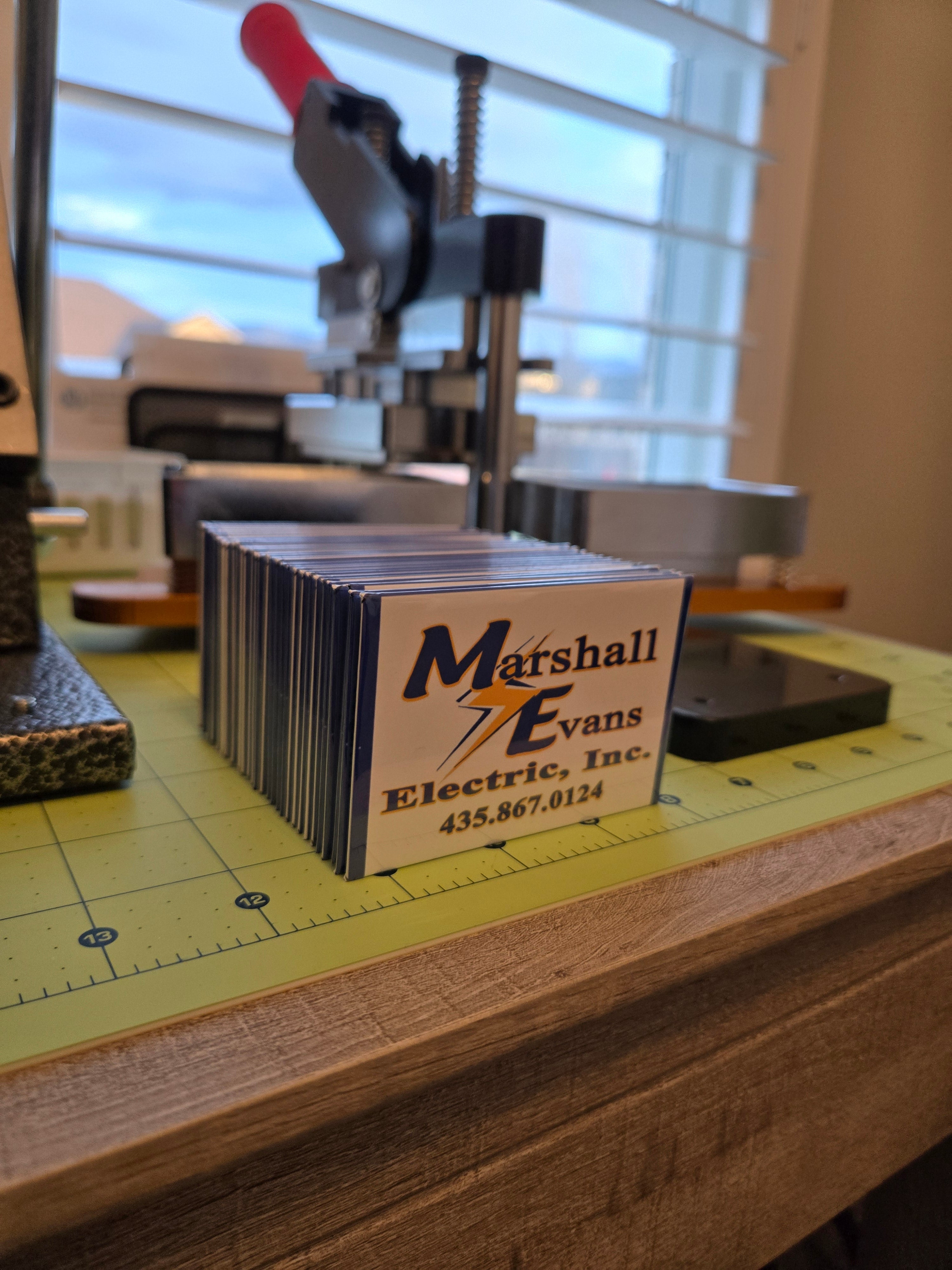Marshall Evans Electric business card on a magnet.