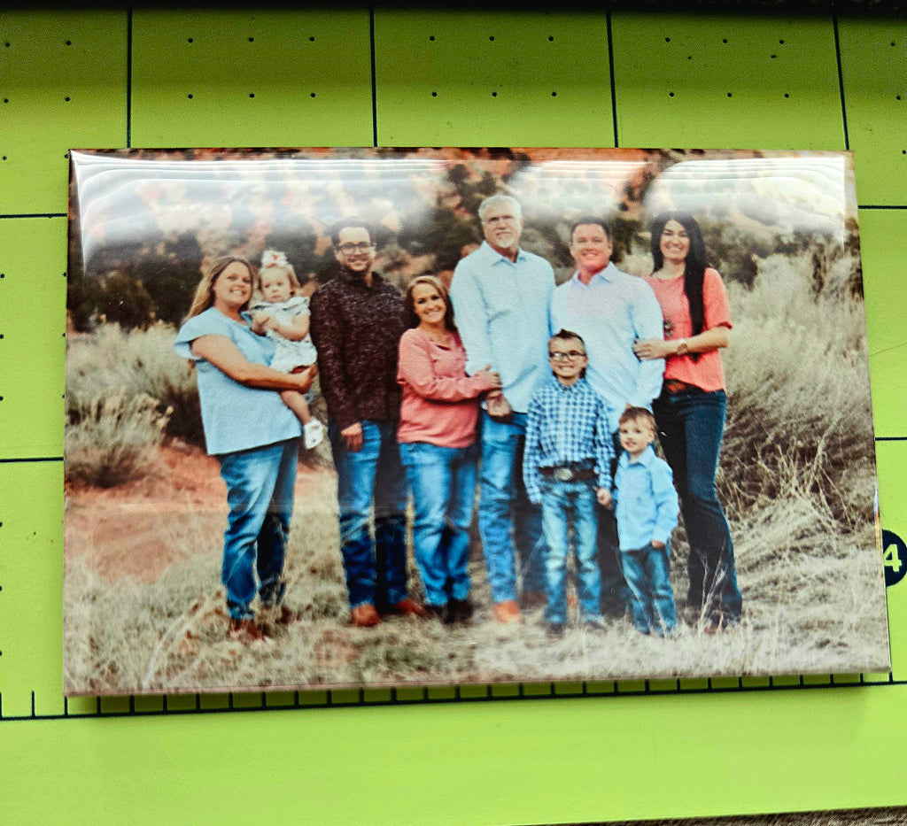 Family photo printed on a magnet.
