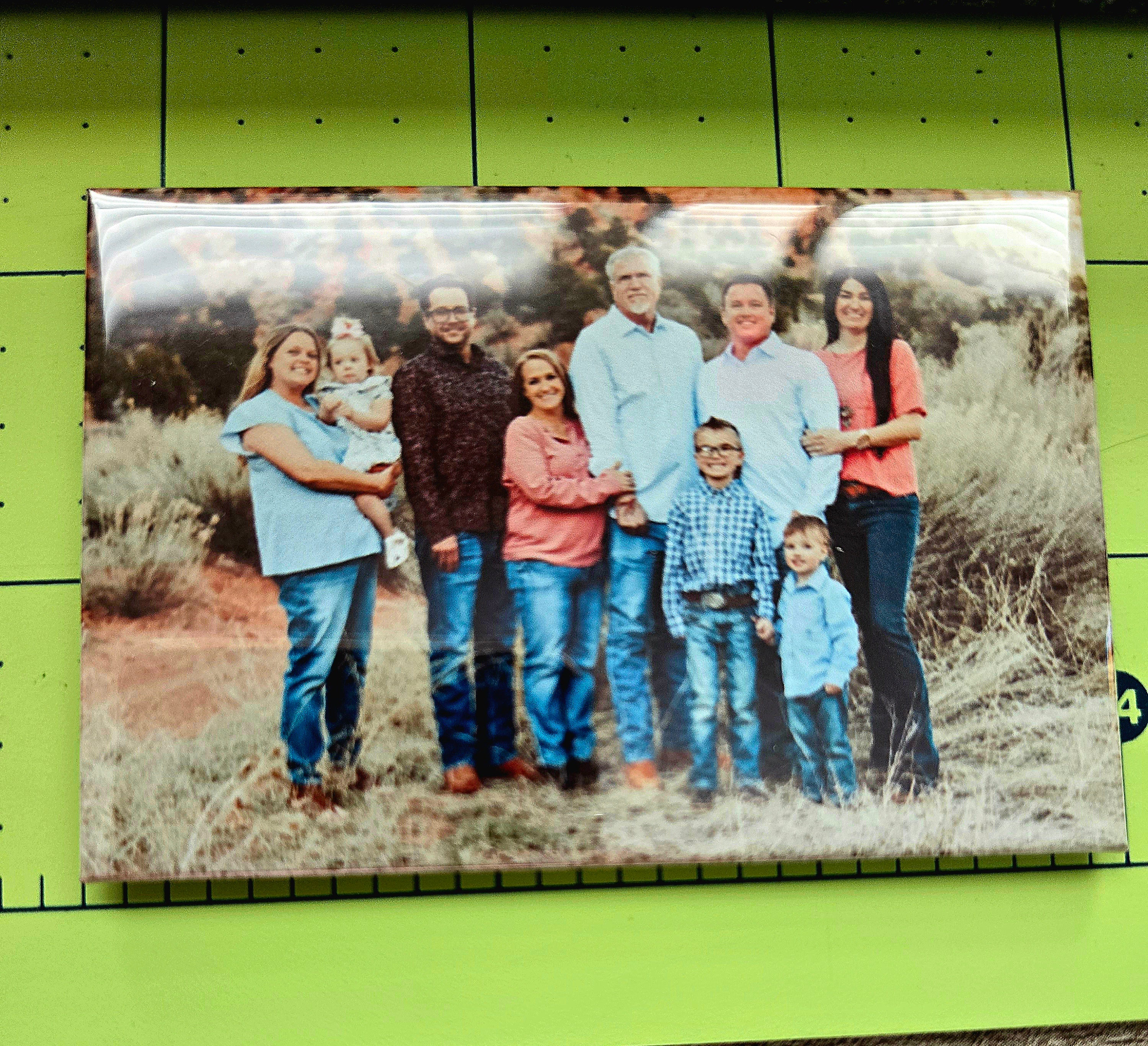 Family photo printed on a magnet.